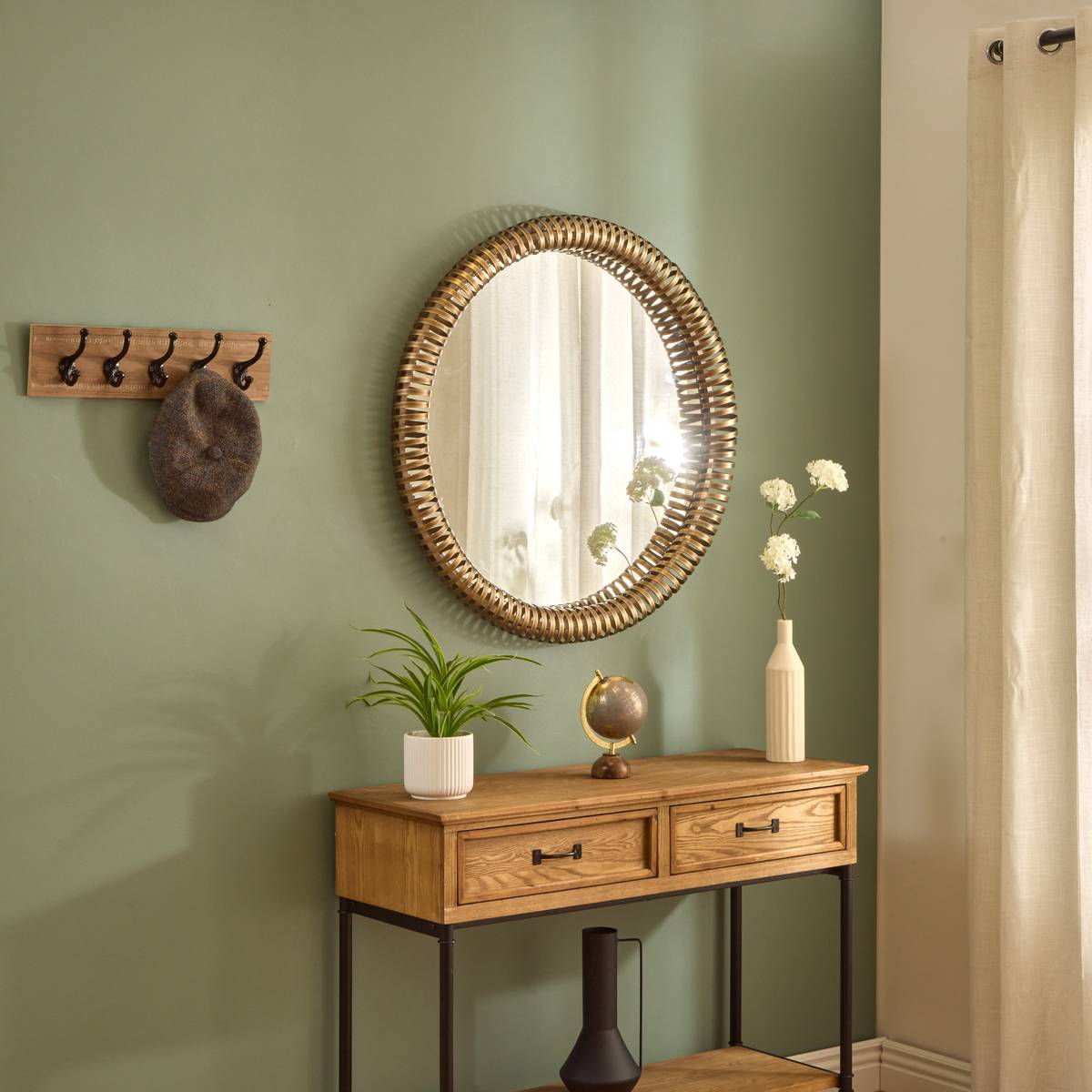 Miroir rond soleil en métal doré D90 cm