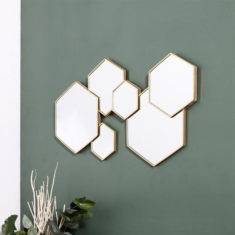 Miroir hexagonal doré 60x36