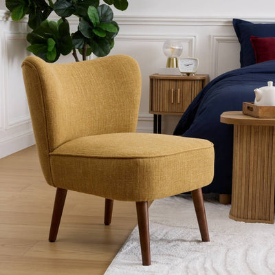 Fauteuil en velours ocre