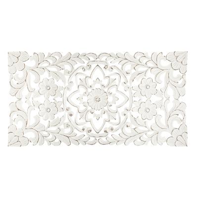 Déco murale en bois sculpté 85x45