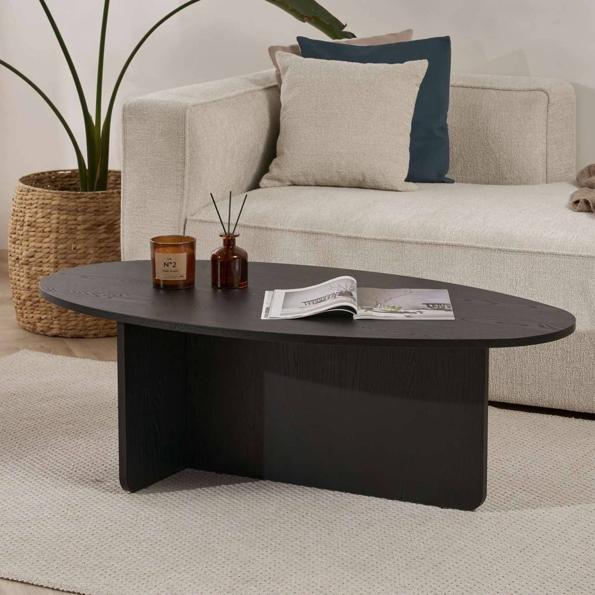 Table basse ovale effet bois noir L120