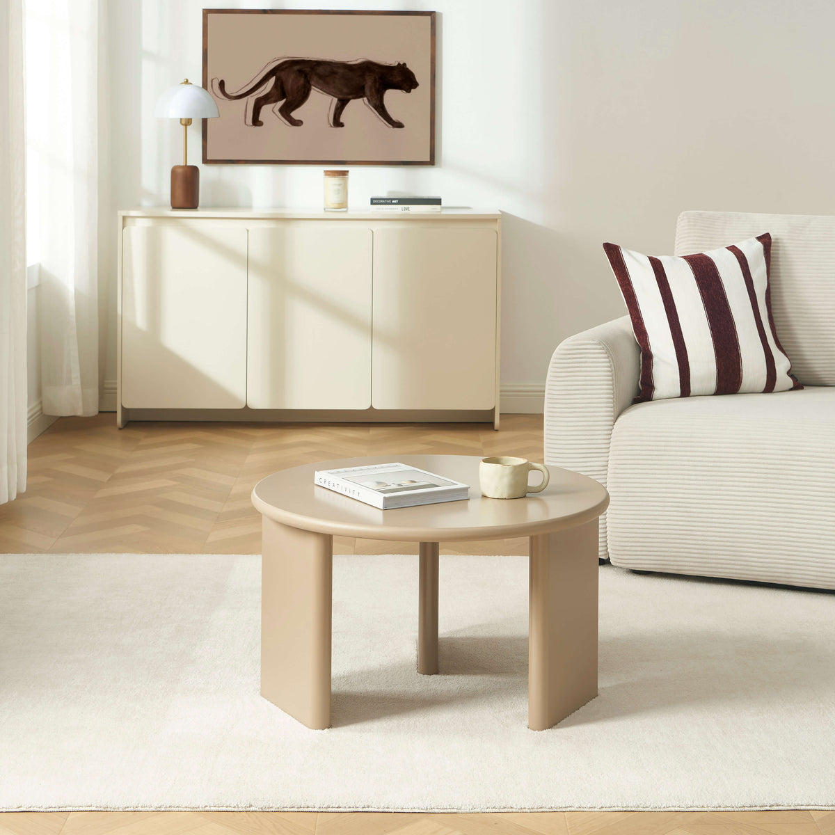 Table basse ronde effet laqué caramel